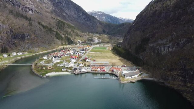 Norways richest municipality Modalen - Aerial approaching town centre from the sea