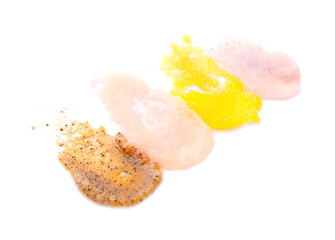 Samples of body scrub on white background