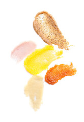 Samples of body scrub on white background