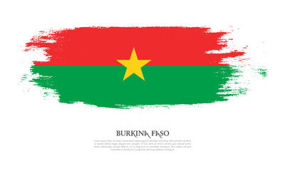Burkina Faso flag brush concept. Flag of Burkina Faso grunge style banner background