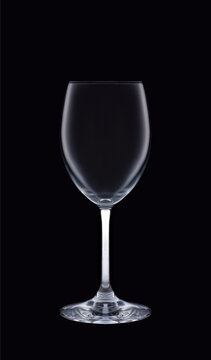 Empty wine glass isolated on dark background. Studio
