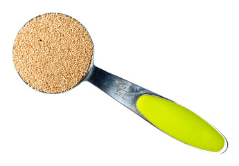 Amaranth grain in measuring spoon cutout