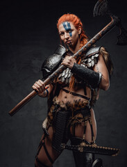 Scandinavian redhead female warrior from north with axe