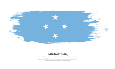 Obraz na płótnie Canvas Micronesia flag brush concept. Flag of Micronesia grunge style banner background