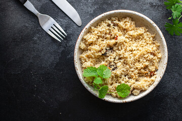 couscous vegetables and spices no meat appetizer fresh portion organic, wholesome dish on the table healthy food meal snack copy space food background rustic. top view veggie vegan or vegetarian food