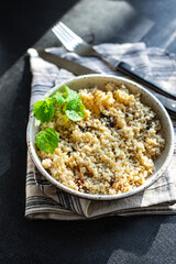 couscous vegetables and spices no meat appetizer fresh portion organic, wholesome dish on the table healthy food meal snack copy space food background rustic. top view veggie vegan or vegetarian food