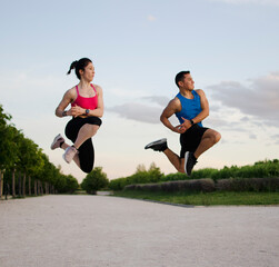 Fitness couple doing exercise in outdoors