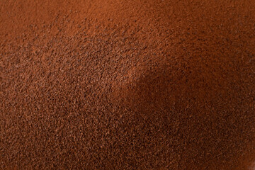 pile cinnamon powder isolated on white background