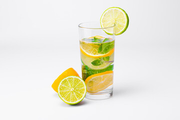 Cocktail isolated on white background. Lemon, lime and mint cocktail.