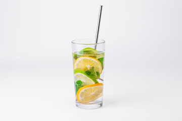 Cocktail isolated on white background. Lemon, lime and mint cocktail.