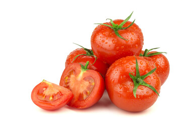 Ripe tomatoes in water drops isolated on white background. Fresh vegetables food.