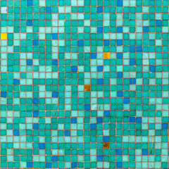 background of small squares in green color with red, blue and yellow spots