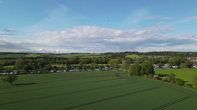 River Thames at Bourne End view over fields , Buckinghamshire UK Aerial footage