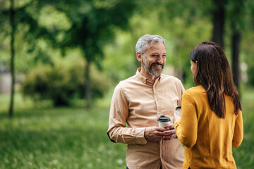 Adult woman happily talking to her husband.