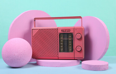 Pink fm radio on podium with geometric shapas. Concept art. Fashion Minimalism