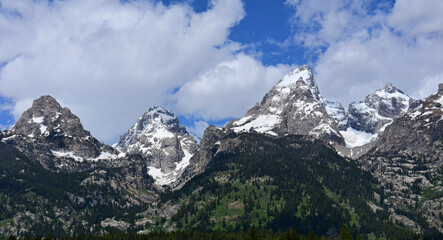 the magnificent  south tetotn, middle teton, and garnd teton peaks  in summer in grand teton national park, wyoming 