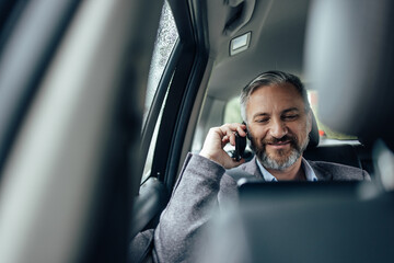 Adult man having a conversation with his business partner.