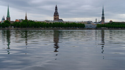 Spring, dawn over the Daugava on the background of old Riga