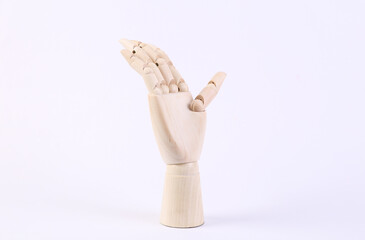 Wooden hand isolated on white background