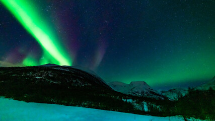 aurora borealis above the clouds