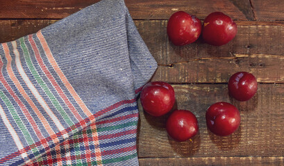 Fresh Plum Fruit on wooden