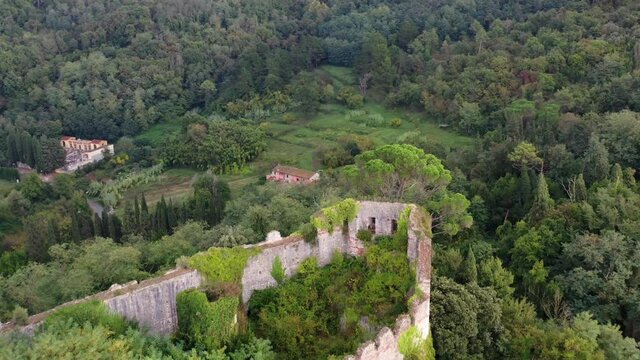 Aerial view an abandoned castle Castello di Ripafratta in Tuscany, Italy.