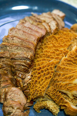 A delicious Chinese dish, a platter of braised vegetables, tripe and beef tongue