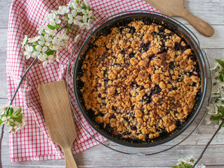 fresh baked cherry crumble pie in a springform pan 
