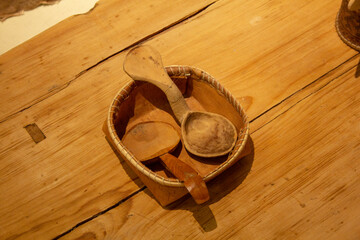 Wooden dishes of the peoples of the north. Spoons and wooden dishes made from natural materials.