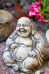 Obraz premium Figurine Cheerful Hotei