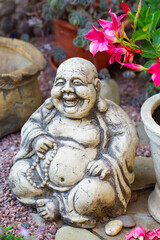 Fototapeta na wymiar Figurine Cheerful Hotei