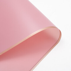 isolated corner of pink cardboard