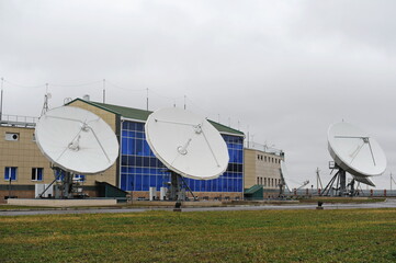 Almaty, Kazakhstan - 11.20.2015 : Parabolic industrial antennas and the territory of the KAZSAT satellite control center