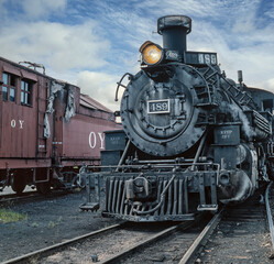 Fototapeta na wymiar Steam locomotive. Train. On steam. Chama New Mexico USA. Rio Arriba County. Cumbres and Toltec Scenic Railroad