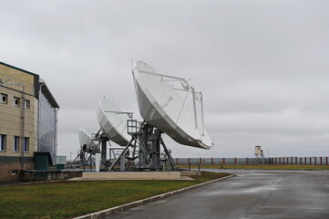 Almaty, Kazakhstan - 11.20.2015 : Parabolic industrial antennas and the territory of the KAZSAT satellite control center