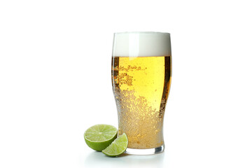 Glass of beer and lime isolated on white background