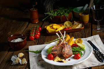 Lamb chops marinated in herbs with green asparagus and lime