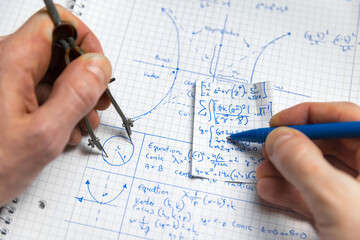 Math handwriting in notebook closeup