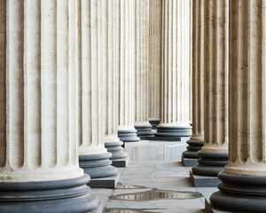 High marble columns as background, architectural design in style of classicism. Architectural pattern