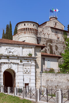 Central entrance to the historic medieval castle of Brescia, Lombardy, Italy (Vertical photo)