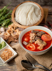 Rice noodles with spicy pork sauce, Khanom Jin Nam Ngiao.
