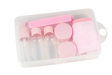 Travel small bottle set, in transparent cosmetic bag on a white background