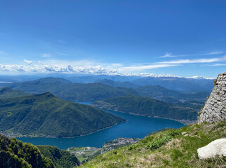 Panorama View from Top of Monte Genereso, Ticino, Switzerland. View to Lugano city, San Salvatore mountain and Lugano lake. 