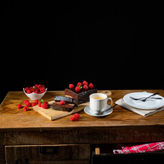 Chocolate cake with raspberries and coffee