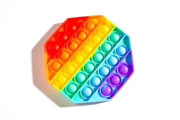 Pop it antistress toy for children. rainbow octahedron isolated on white background with shadow