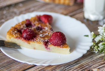 Homemade strawberry cake. Stot on the kitchen table.
