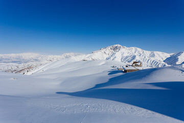 The winter landscape of the mountain blue sky and top