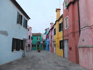 Fototapeta na wymiar Buranos Narrow Streets with Beautiful Colorful Facades in Italy´s Venice