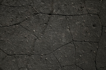asphalt in cracks texture / abstract background cracks on asphalt road