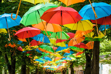 Fototapeta na wymiar colorful umbrellas in the garden